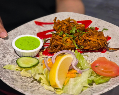 Crispy Pakoras with Sauce and Salad Served at Gurkha Country Bar & Grill Worcester